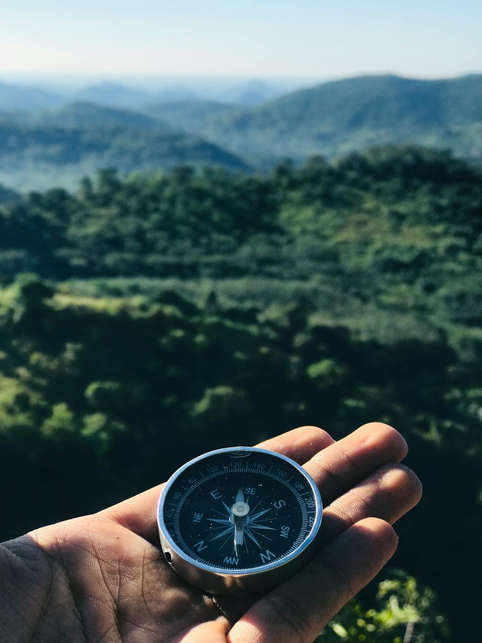 round grey and black compass